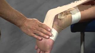 Protect a strained or sprained Achilles tendon with athletic taping [upl. by Neeron]