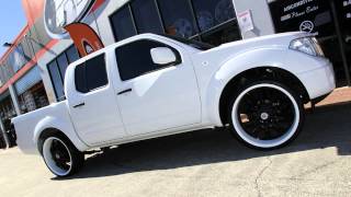 Nissan D40 Navara 24 inch custom rims painted Lexani LSS10 black wheels [upl. by Nalyt60]