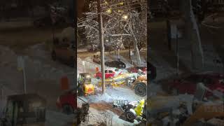 Montreal snow plow pushes car stuck in snow bank [upl. by Rednasxela380]