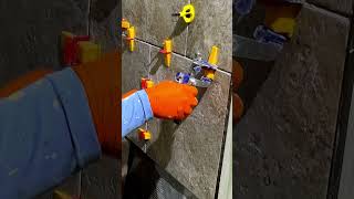 What Best the Spinner or Wedge Tile Leveling System tilebathroom tilebathroom tipsandtricks [upl. by Aytak838]