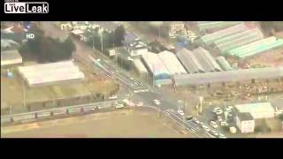 Aerial view of tsunami striking Sendai Japan [upl. by Babbie]