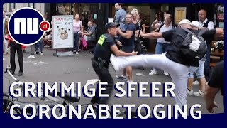 Demonstranten vallen agenten aan bij coronaprotest in Den Haag  NUnl [upl. by Tunk]