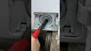 How to remove a STUCK BROKEN washing machine drain FILTER PLUG [upl. by Sarkaria]