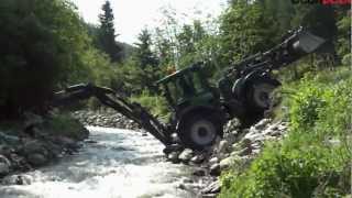 River crossing with a backhoe loader  Bachdurchquerung mit einem HUDDIG in Österreich [upl. by Tait865]