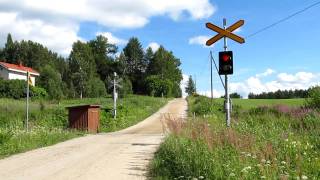 Regiona train H 743 passed Vanha maantie Km 05220523 level crossing in Punkaharju Finland [upl. by Imhsar]