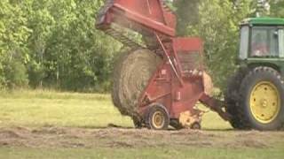 JD4430 and 851 round baler [upl. by Yatnuahs]