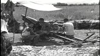 US soldiers inspect weapons and Chinese soldiers fire 75mm pack artillery at MyitHD Stock Footage [upl. by Atteragram]