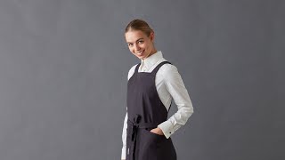 How to put on a cross back strap apron [upl. by Ahsienyt]