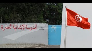 École primaire à Mnihla  Le drapeau national retrouvé brulé [upl. by Kcirej120]