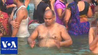 Thousands take holy dip in river Ganges to mark Hindu festival [upl. by Atirehs]