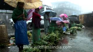 Its business as usual in Cherrapunji even in pouring rain [upl. by Champaigne]