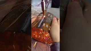 Handheld Laser Welder in Action  Factory Footage of Seamless Welding [upl. by Ateiluj115]