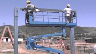 Outback Steel Buildings 11  Install Eave Purlins and Sidewall Girts on First Set of Columns [upl. by Linehan935]