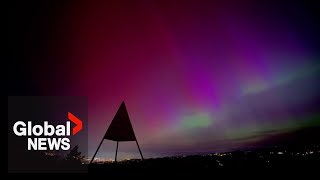 Northern Lights Timelapse captures Aurora Borealis illuminating the night sky around the world [upl. by Eibbil]