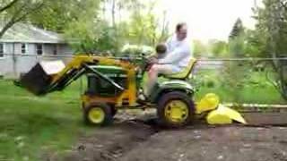 Tilling with John Deere 140 [upl. by Lindberg]