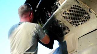 JTFBravo Soldier performs post flight maintenance on CH 47 Chinook [upl. by Accem]