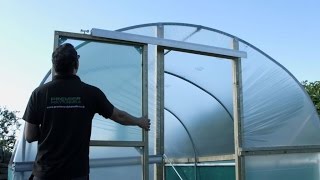 Fitting a Sliding Door to a Polytunnel  Double Doors Fixings on a Polytunnel [upl. by Adlesirhc]