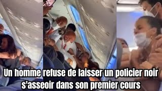 Un homme refuse de laisser un policier noir sasseoir à côté de lui [upl. by Jany614]