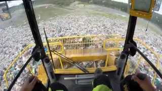 Operating TANA E320eco landfill compactor [upl. by Lorac886]