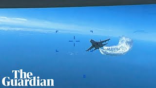 US military video shows moment Russian aircraft intercepts US drone over Black Sea [upl. by Atsuj938]