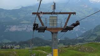 Stoos 24 Chairlift Views Descending from Fronalpstock [upl. by Kashden]