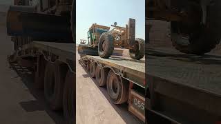 motor grader unloading trailer [upl. by Jemimah]