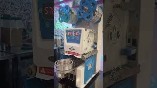 Ice crusher machine and label packing auto machine [upl. by Idissak]