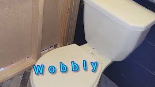 How to fix a wobbly toilet [upl. by Llerrah526]