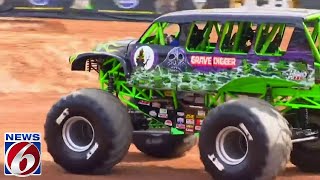 Grave Digger other Monster Jam trucks roll into Orlando [upl. by Burrow]