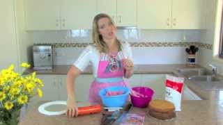 How To Covering a Round Cake in Fondant [upl. by Vey]