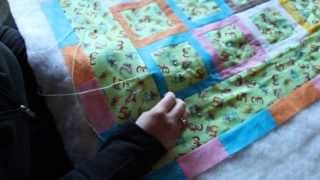 Quilting How to tie a quilt using the quotHidden Tiequot or quotInternational Stitchquot [upl. by Let531]