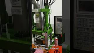 250sth Fully Automatic Wire Vertical Power Plug Wire Plastic Injection Molding Machine [upl. by Enilekcaj]