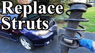 How to Replace Struts in your Car or Truck [upl. by Eiblehs]