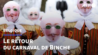 A Binche le retour dun des plus célèbres carnavals de Belgique  AFP [upl. by Lewan]