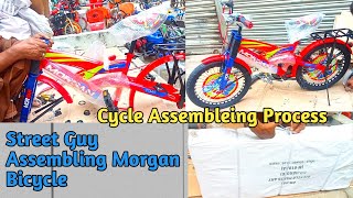 street Guy Assembling Morgan bicycle [upl. by Ahsuat]