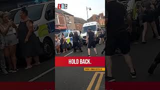 Rioter gets bitten on the arse by a dog while another gets bricked in the nuts  LBC [upl. by Adali257]