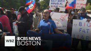 Haitians rally in Boston to protest Trumps false claims about immigrants in Ohio eating pets [upl. by Lissa209]