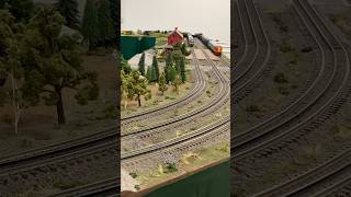 O Scale trains speed past at the Minnesota Twin Cities Model railroad show [upl. by Tobye]