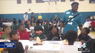 Jaguars’ D’Ernest Johnson hosts Thanksgiving dinner for kids [upl. by Aihsel]