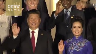 President Xi Jinping and his wife Peng Liyuan welcome world leaders arriving for the banquet [upl. by Aekahs]