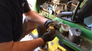 How to Clean Lawnmower Carburetor John Deere LT155 [upl. by Yenrab]