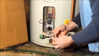 Replacing a water heater element [upl. by Faunia]