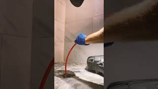 Clearing a Clogged Shower Drain with Chain Knocking [upl. by Beal]