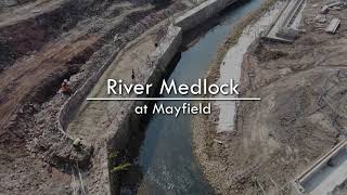 Mayfield Park drone video River Medlock winds through Manchester construction site [upl. by Nyleahs]