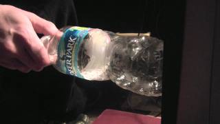 How to expand a plastic bottle with heat  Science 101 [upl. by Hooker383]