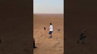 Thrilling Sandboarding Adventure in the Dubai Desert Sandboarding DubaiDesert TravelDubai [upl. by Wohlen]