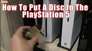 How To Put A Disc In The PS5  PlayStation 5 [upl. by Balthasar439]