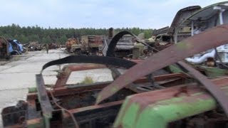 chernobyl 2012 II the radioactive cemetery of vehicles burjakivka Бурякiвка [upl. by Eilujna]