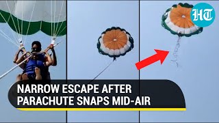 Watch Parachute rope snaps midair during parasailing in Diu couple crashes into sea [upl. by Adla]