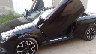 OPEL astra H twin top lambo doors [upl. by Naillimxam787]